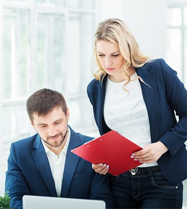 male-and-female-office-workers-PW9YX2Z-cropped